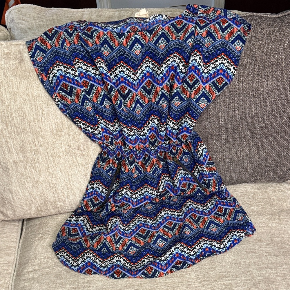Women’s mini dress. Blue and orange vibrant print.